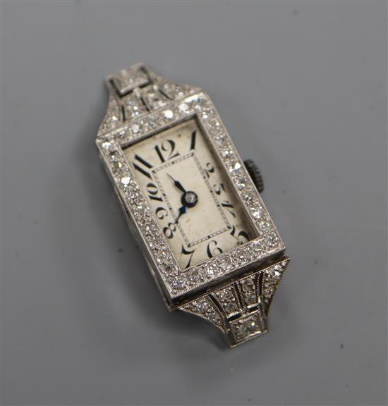 A ladys white metal (stamped plat) and diamond set cocktail watch (a.f.).